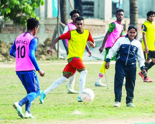 DHAKA: In this photo taken on February 5, 2020, head coach of Dhaka Football City Club, Mirona (R), reacts as she trains players on a field on the outskirts of Dhaka.  —AFP